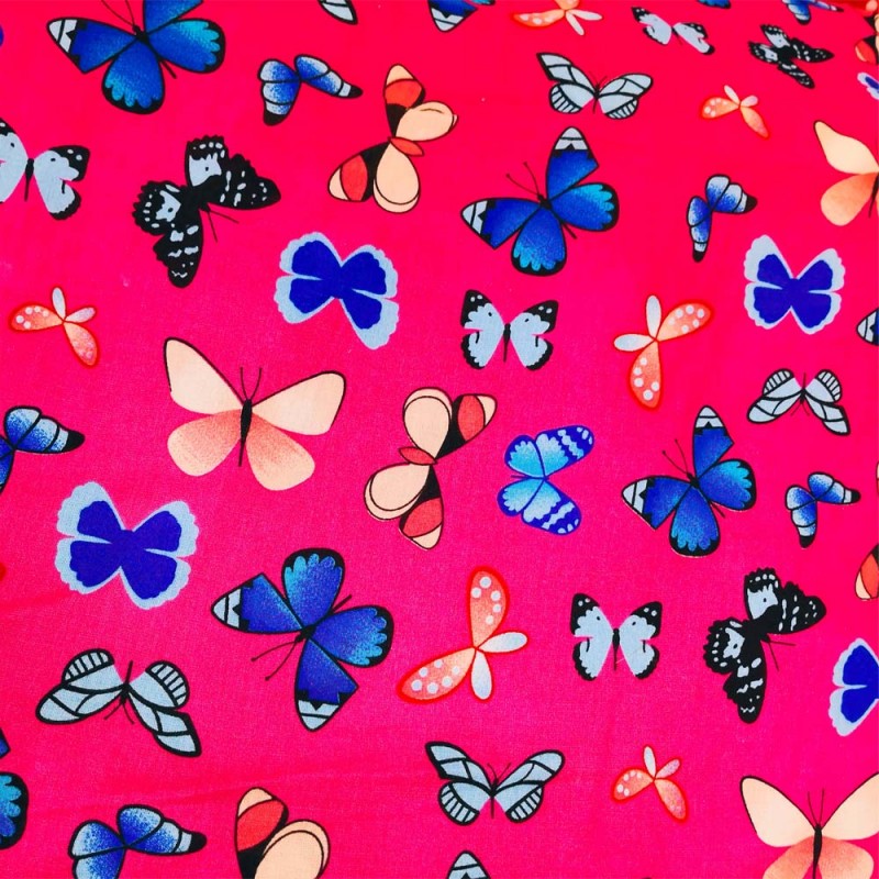 Tissu Viscose imprimée de papillons multicolores sur un fond fuchsia. Tissu Viscose imprimée de papillons multicolores sur un fond fuchsia.